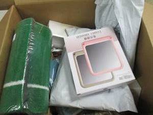 box of golf mat, towel mirror and m...