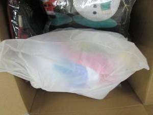 box of tree skirts and inflatable u...