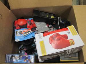 box of exercise and knee pads and m...