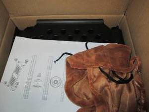 box of dog pool and hanging cat bed...