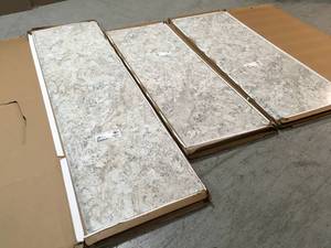 lot 37 image: Lot of 6 ft. Beige Laminate Countertop Kit with Full Wrap Ogee Edge in Spring Carnival Granite by Hampton Bay Customer Returns See Pictures