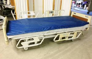 lot 1 image: WOW MSRP $14,000 HILL ROM ADVANCE SERIES HI LOW ELECTRIC ADJUSTABLE HOSPITAL BED WCHAIR POSITION INCLUDES HIGH QUALITY MATTRESS WHICH PREVENTS PRESSURE SORES GREAT WORKING CONDITION 