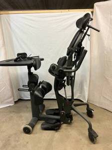 lot 6 image: MSRP $5000 EASYSTAND EVOLV&nbspADULT MEDIUM OR YOUTH&nbsp180lb WEIGHT CAPACITY USER HEIGHT RANGE 4-56&nbspSIT TO STANDING FRAME&nbspFOR PHYSICAL THERAPY PATIENTS &amp WHEELCHAIR USERS&nbspLAPTOP WORKSTATION - GREAT CONDITION