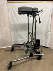 lot 11 image: BIG WOW MSRP $6000 GATE BURE RISE &amp GO BATTERY OPERATED WALKER - RAISES &amp LOWERS PATIENTS FROM &amp TO A SITTING POSITION  ASSISTANCE WALKER ACCESSORIES CAN BE PURCHASED ONLINE WORKS WHEN PLUGGED IN BUT BATTERY DOES NOT HOLD A CHARGE...