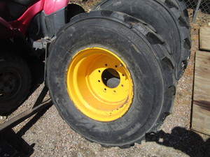(4) Skid Steer Wheels & Tires
