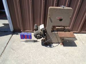 Vintage Toro table top band saw. Heavy cast unit. Tested & works. As shown.