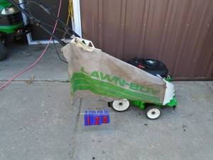 Lawn Boy self propelled lawn mower with bag & recycling plate. Tested & works. As shown.
