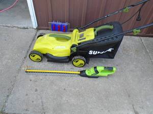 Sunjoe 110 volt lawn mower & Earthwise hedge trimmer. No battery or charger included. As shown.
