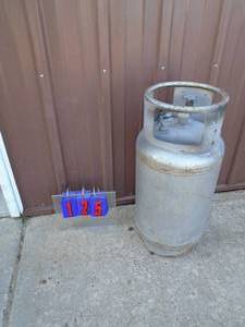 30 lb forklift propane tan. Seems to have some propane left in it. As shown.
