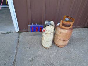 Qty of 2 small propane tanks. As shown. Small one is 16 tall. As shown.