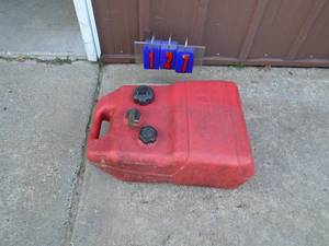 Tempo plastic outboard motor tank. As shown.