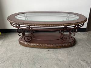lot 24 image: Glass Top Coffee Table on Rollers