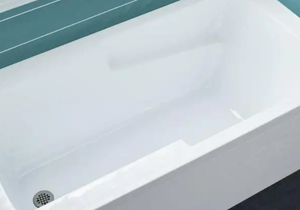 lot 66 image: Swiss Madison Ivy 60 x 30 Left Hand Drain Alcove Soaking Bathtub wApron, White