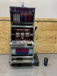lot 17 image: UNIVERSAL Full Size Slot Machine