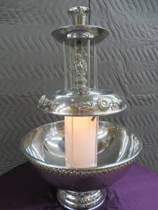 STAINLESS STEEL LIGHTED FOUNTAIN.