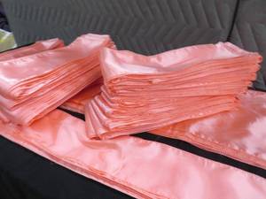 CORAL SATIN RUNNERS AND CHAIR SASHES