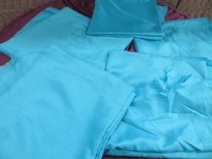5 LARGE PIECES OF TURQUOISE MATERIAL.