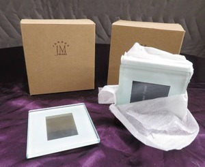 2 NEW BOXES OF PHOTO FRAME COASTERS.