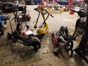 lot 13 image: Lots of Scooters