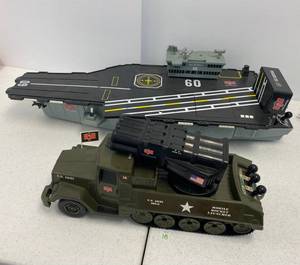 lot 18 image: Vintage G.I. Joe Vehicles Battery Operated U.S.S. Saratoga and Mobile Rocket Launcher