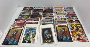lot 34 image: Large Group Of Superhero Comic Books In Sleeves And Carded