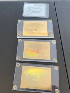 lot 77 image: Four Star Trek Holographic Trading Cards Three In Acrylic cases