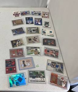 lot 84 image: Group Of Misc. Sports Patch Cards In Protective Sleeves