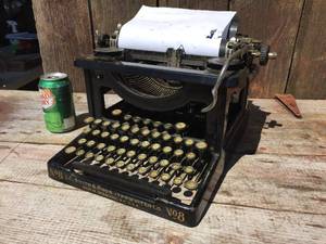 lot 23 image: Antique L.C. Smith & Bros. Typewriter Co.