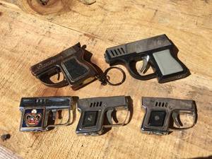 lot 40 image: 5 Vintage Small Pistol Themed Lighters