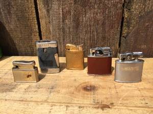 lot 64 image: 5 Vintage Pocket Lighters - Evans - Colibri - Ronson