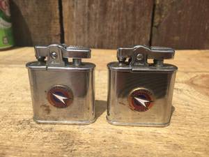 lot 65 image: 2 Vintage Penguin Northwest Airlines Pocket Lighters