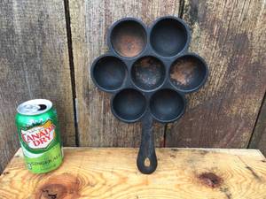 lot 95 image: Vintage Cast Iron Egg Poacher AEBelskiver