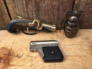 lot 126 image: Vintage Gun - Grenade Lighters
