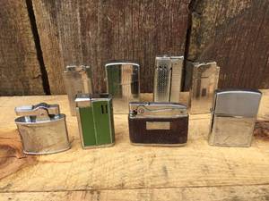 lot 127 image: Nifty Vintage Pocket Lighters