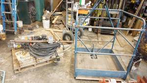 Sky Climber Scaffolding with 10 foot front 8 foot rear Aluminum BeamsComplete swing stage set up minus the platform.
