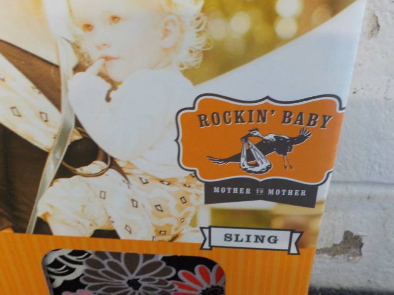 lot 48 image: Rockin Baby Sling retail $52...