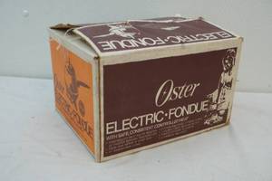 lot 62 image: Oster electric fondue set