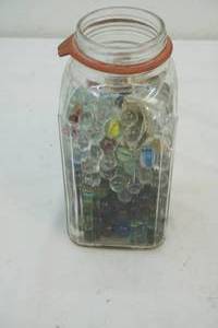 lot 101 image: jar of glass marbles