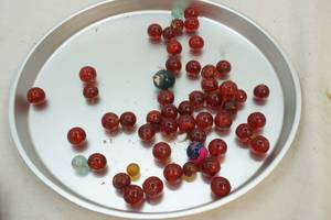 lot 107 image: crackled red marbles