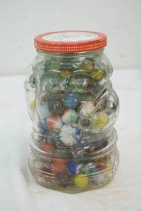 lot 110 image: jar of glass marbles