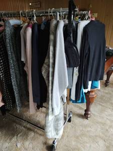 Two-Tier Clothing Rack with Contents