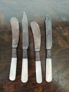 Four Sterling Silver Knives with Mother of Pearl Handles