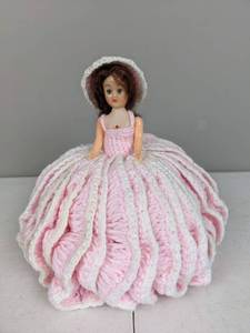 lot 91 image: Crochet Patterned Pink Dress 10-Inch Doll