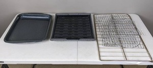 lot 107 image: Assortment of Oven Pans and Racks