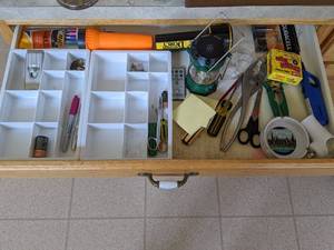 lot 106 image: Assortment of Junk Drawer Items Sharpie, Scissors, Screwdrivers, Batteries, Flashlight, Tape, Sticky Notes, Ashtray, Candle Lighter and More