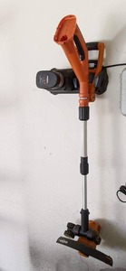 lot 136 image: Cordless Battery Powered WORX 18-Volt 10-Inch Grass String Trimmer and Edger