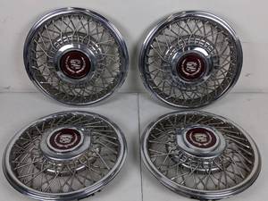 lot 9 image: Set of 4 Cadillac DeVille Hubcaps (1989-1993)