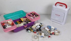lot 86 image: Sew Many Sewing Goodies  Singer Sewing Kit, Many Spools of Thread, Needles, Tape Measures, Thimbles and Much More