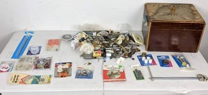 lot 61 image: Wooden Box Filled with NEW and Used Home Repair Items (Plumbing, Picture Hanging, Chair Tips, Door Stops and More)