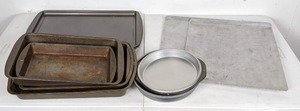 lot 69 image: Assortment of Metal Bake Ware Round Cake Pans, Rectangular Cake Pans, Cookie Sheets and More